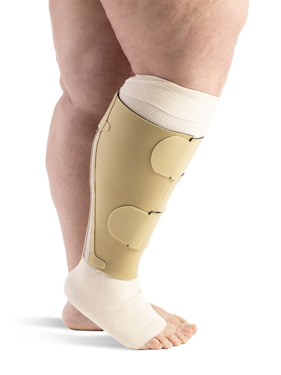 Woman wearing Sigvaris MCE Compreflex Reduce Calf inelastic compression garment in Beige