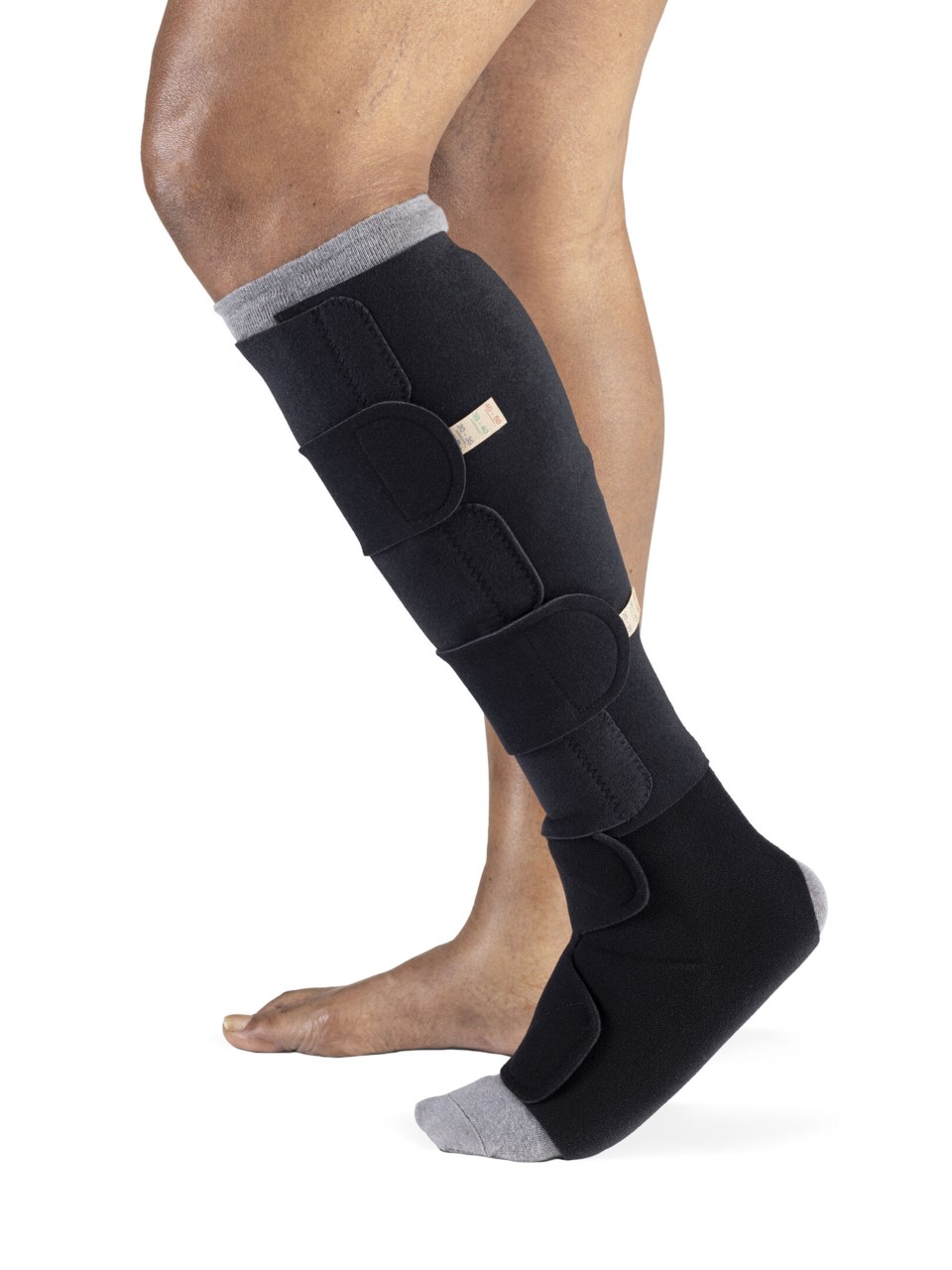 Male wearing the COMPREFLEX STANDARD CALF and FOOT in BLACK